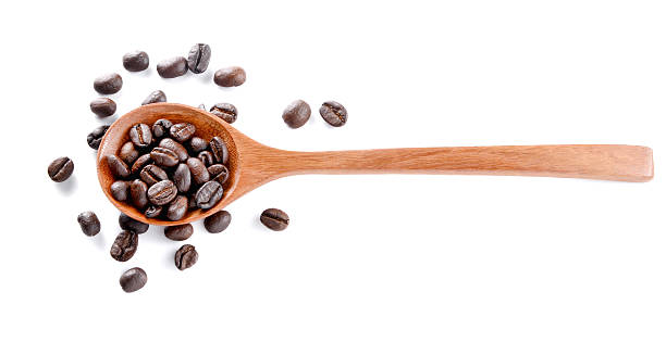 istock Roasted coffee,woden spoon on white background. 490509732