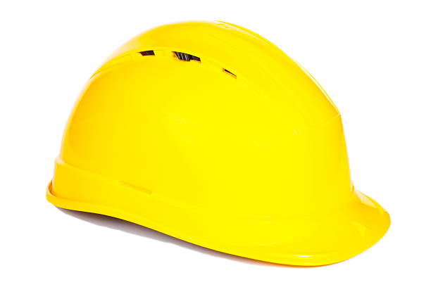 istock Closeup of yellow protective helmet on white background 490509918