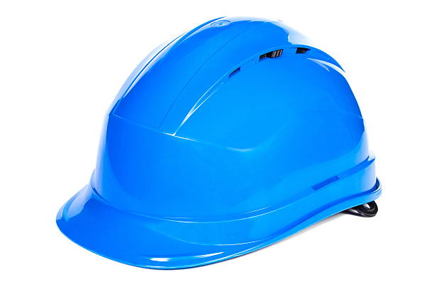Row of hardhats on building site