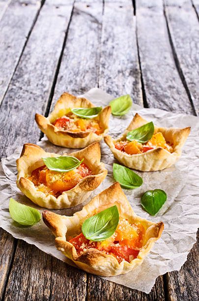istock Tart with tomatoes, cheese and Basil 490512136