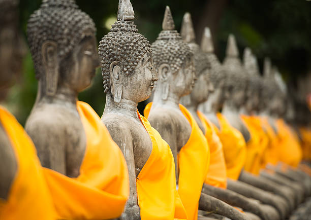 istock old Buddha statue in temple at Ayutthaya 490512602