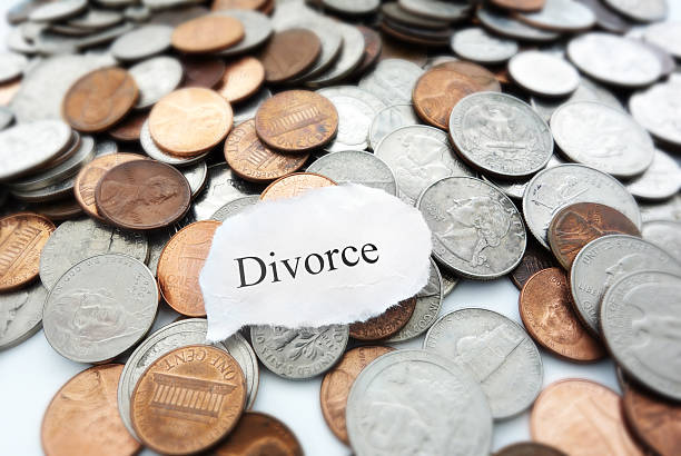 divorce coins Divorce text on a pile of coins precious metals roth ira stock pictures, royalty-free photos & images