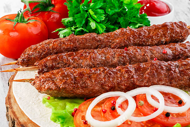 istock shish kebabs on wooden skewers 490523585