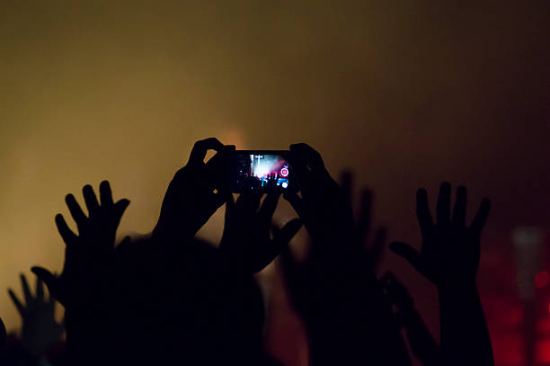 istock rock concert crowd people 490523711
