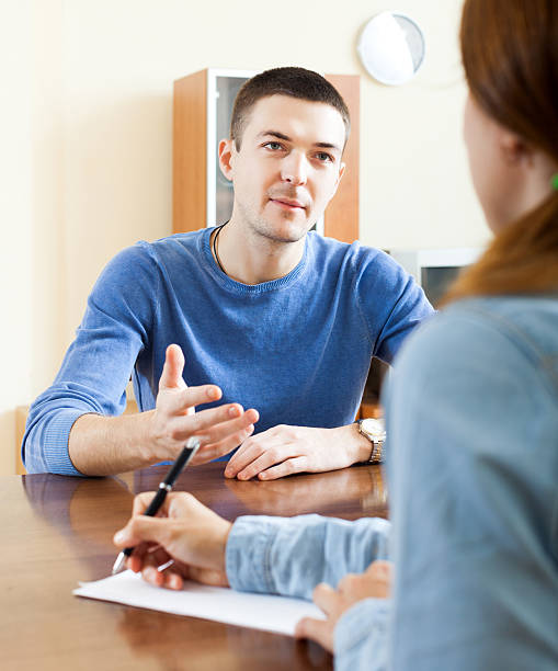 istock Man  filling questionnaire for employee 490524019