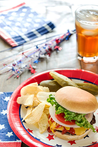 istock Cheeseburger loaded with toppings in a patriotic theme 490525037