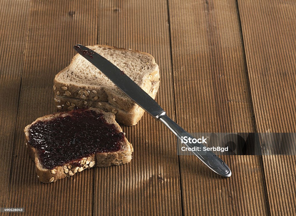 Homemade jam on  integral bread. Homemade jam on homemade integral bread. Bread Stock Photo