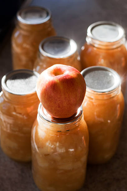 Jars of freshly home-canned applesauce.