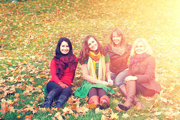 istock young women in the autumn park 490543470