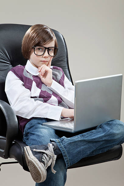 istock boy with laptop,portrait 490549582