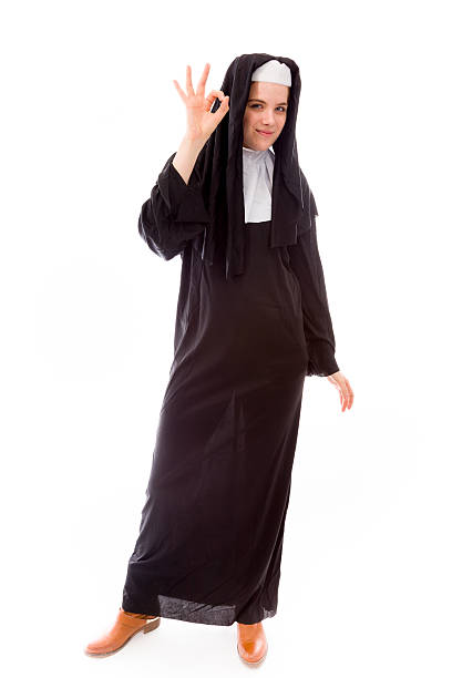 istock Young nun showing ok sign 490553639