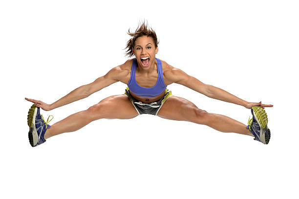 African American woman jumping isolated over white background