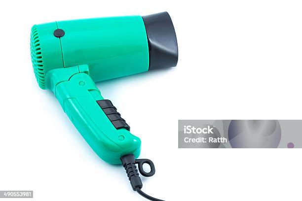 Compact Green Hair Dryer Stock Photo - Download Image Now - Blowing, Body Care, Cable