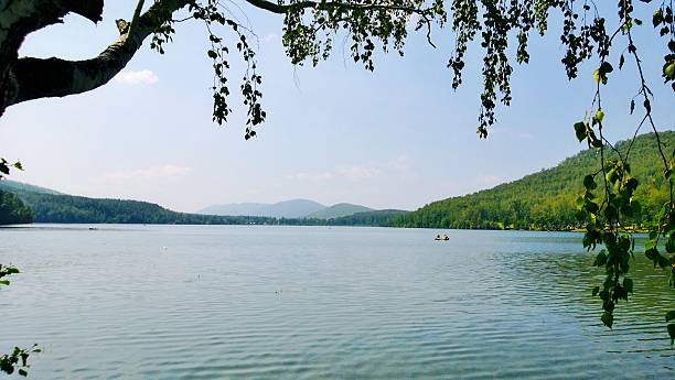 istock View over the lake to the blue hills 490554078
