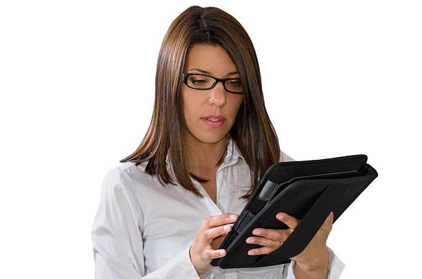 Businesswoman with a touch pad computer stock photo