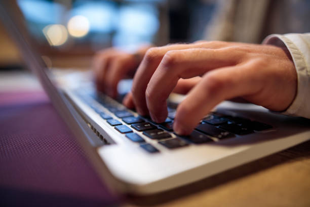 istock Close up of unrecognizable person typing on laptop. 490554730