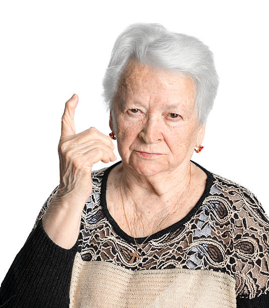 istock Old woman in angry gesture 490555280