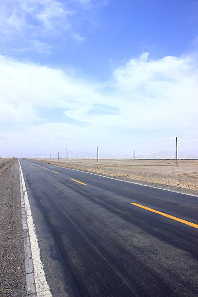 istock Asphalted road and the blue sky 490555872