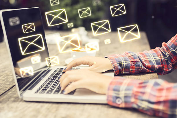 istock Email concept with laptop ang girl hands 490556026