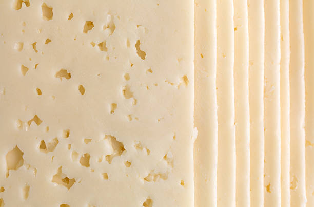 istock Slices of Havarti cheese close view 490556856