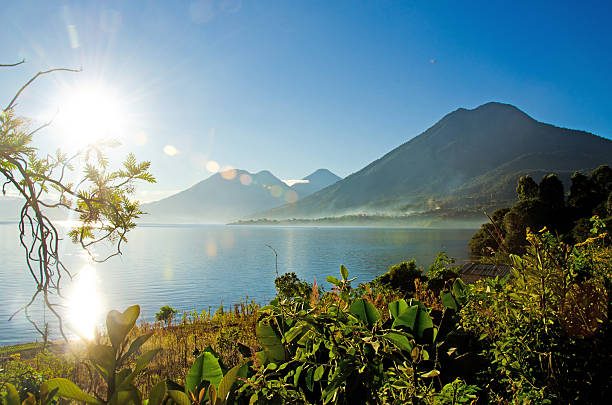 Sun moon lake in nantou, taiwan, reflects the sky in its emerald green water under a cloudy sky