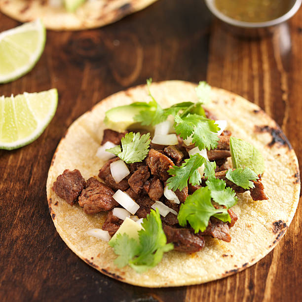 istock mexican food - soft tortilla corn taco 490560201