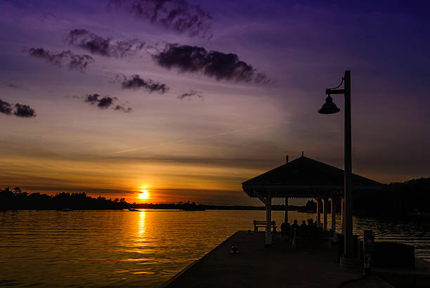 istock Sun Setting Over the Lake at the Wharf 490560419
