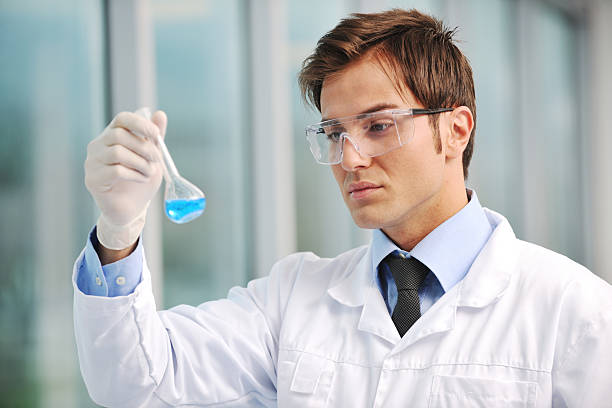 research and  science doctor student  people  in bright laboratory representing chemistry education and medicine concept