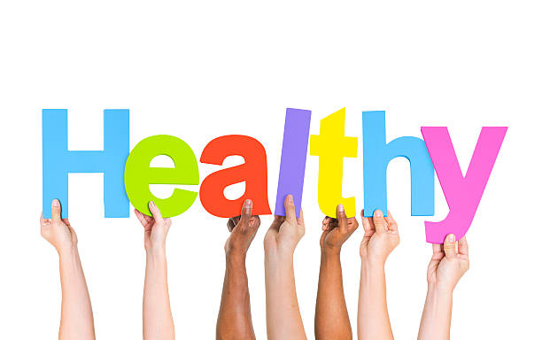 istock Diverse Hands Holding The Word Healthy 490561375