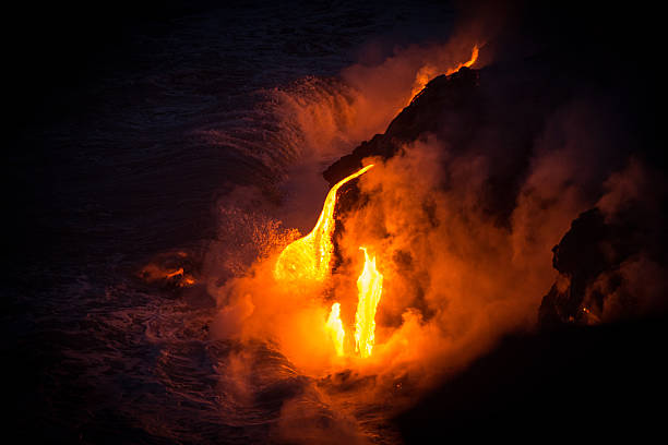 istock Lava Flowing into the Ocean at Kilauea 490576283
