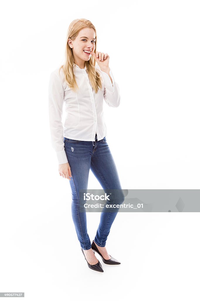 Mujer joven morder fingernails - Foto de stock de 20-24 años libre de derechos