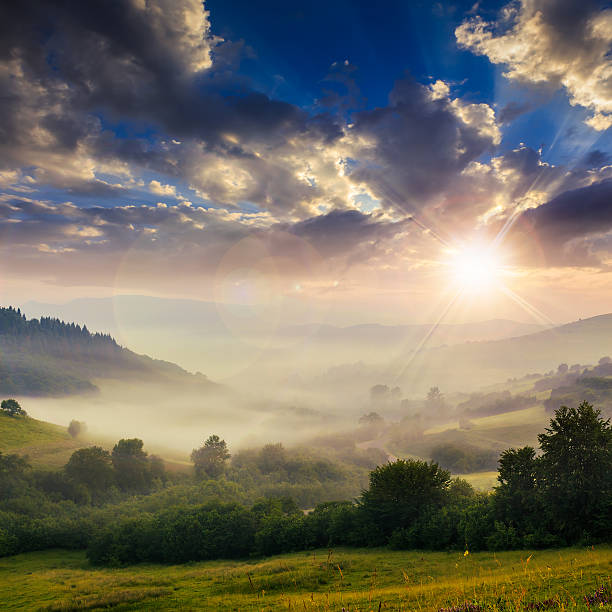 istock cold fog on hot sunset in mountains 490577947