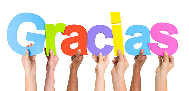 istock Multiethnic Group of Hands Holding Word Gracias 490581131