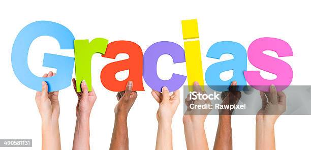 Multiethnic Group Of Hands Holding Word Gracias Stock Photo - Download Image Now - Thank You - Phrase, Gratitude, Grace