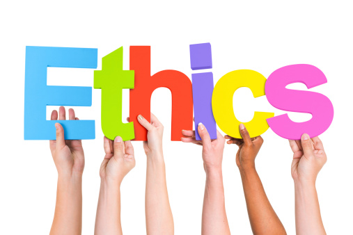 Diverse Hands Holding The Word Ethics