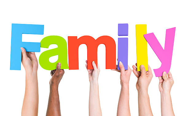 istock Diverse Hands Holding The Word Family 490581375