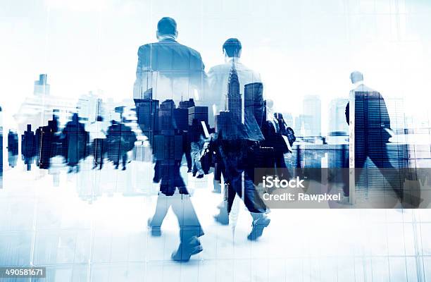 Abstract Image Of Business People Walking On The Street Stock Photo - Download Image Now
