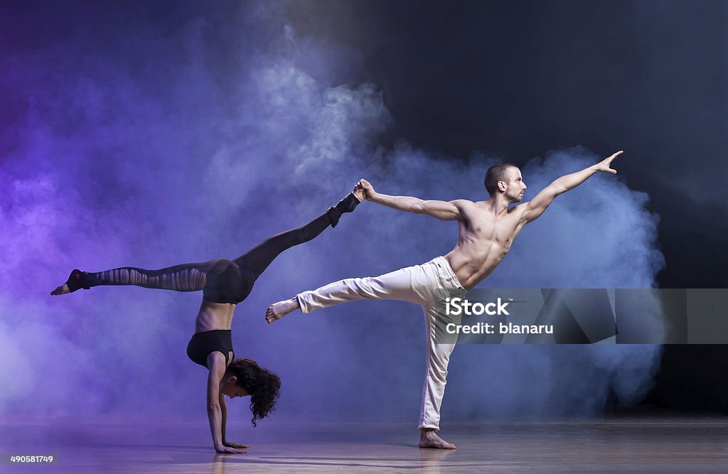 Contemporary Dance Sensual couple performing an artistic and emotional contemporary dance. Dancing Stock Photo
