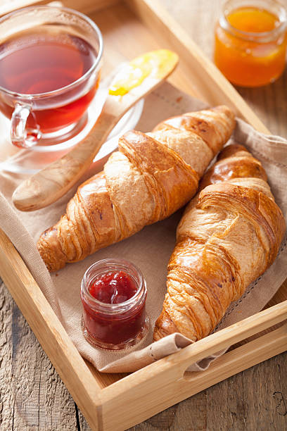 istock fresh croissants with jam for breakfast 490582463