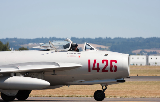 Hillsboro, United States- August 4, 2012:  The Oregon International Airshow is a 3 day event in Hillsboro, Oregon. This image shows a Mikoyan-Gurevich MiG-17 jet taxiing in to show center after the flying demonstration.