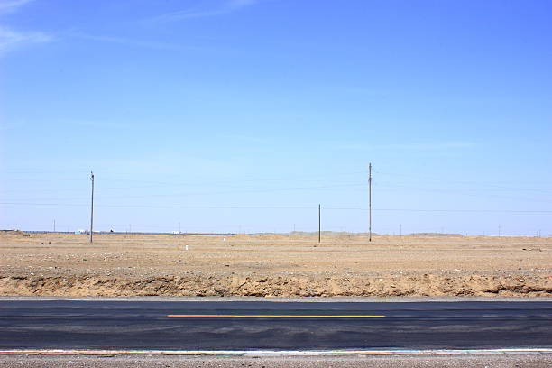 istock Asphalted road and the blue sky 490583640
