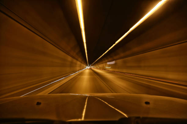 istock driving trough the tunnel 490584516