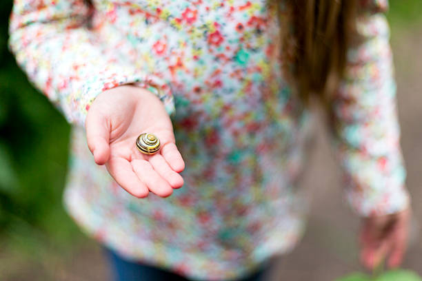 istock Little girls like snails too. 490584788