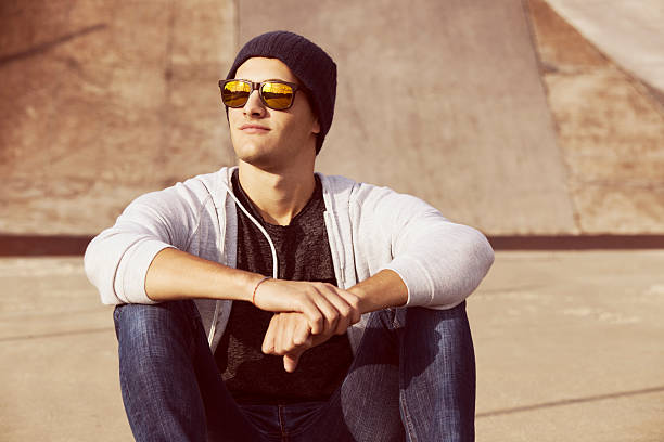 istock young man with color filters and sun 490587852