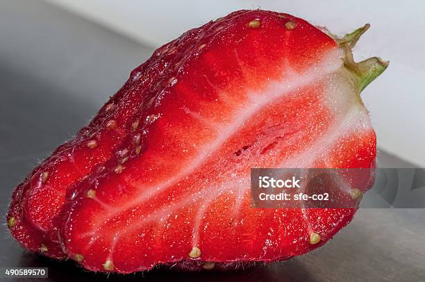 Single Sliced Strawberry Stock Photo - Download Image Now - 2015, Beauty, Beauty In Nature