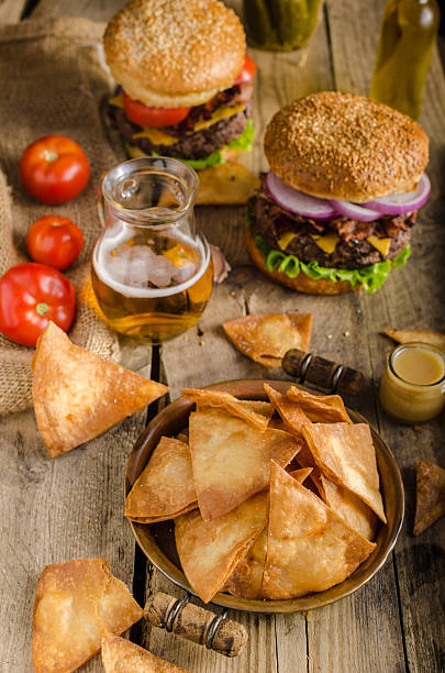 istock Homemade nachos with rustic burger 490589660