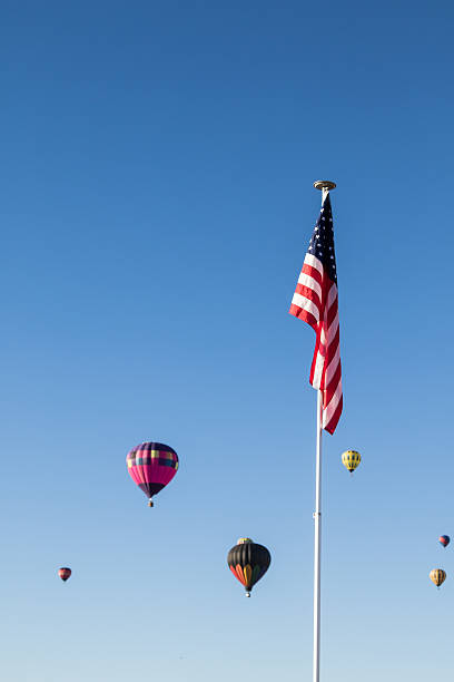 istock Hot Air Balloons Over the American Flag 490589848