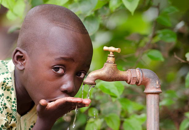 istock Collecting Water for African Children Project Fresh 490592826