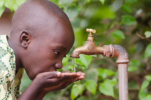 istock Congo African Boy in need for Clean Fresh Water 490606762