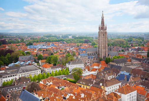 Cityscape with church of Our Lady Bruges view from top during summer in Belgium